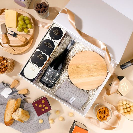 hampers-for-employees-with-round-cheese-board-add-your-logo-and-wine-and-snacks