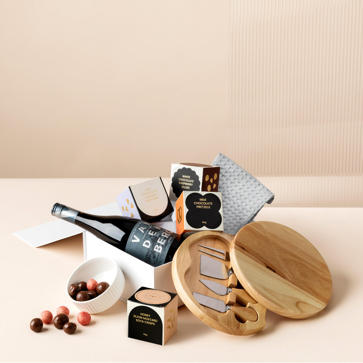 style-bundle-the-choc-and-cheers-hampers-for-employees-with-chocolate-and-wine-and-round-serving-board