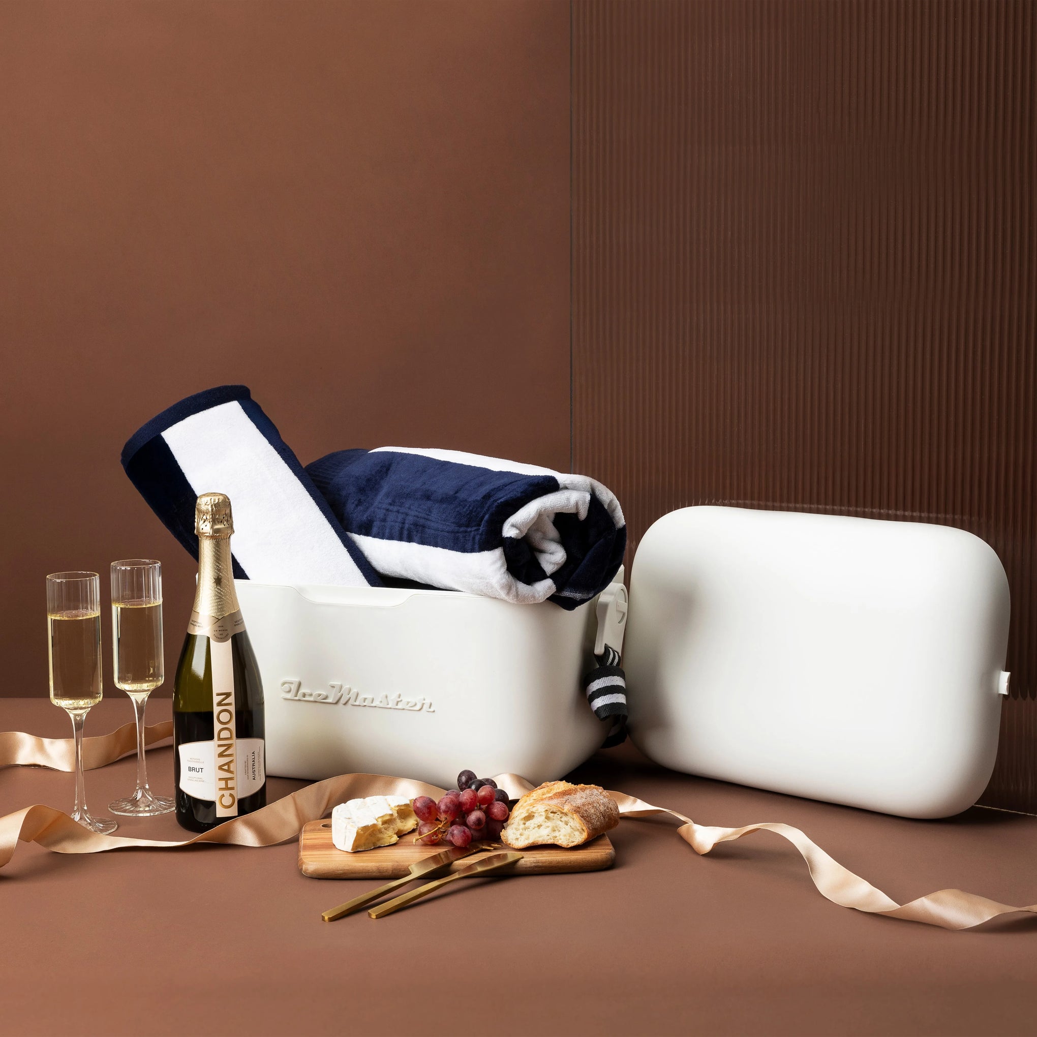 style-bundle-gifts-for-beach-lovers-the-beach-day-and-bubbles-with-esky-and-velour-towels-and-acacia-board-with-chandon
