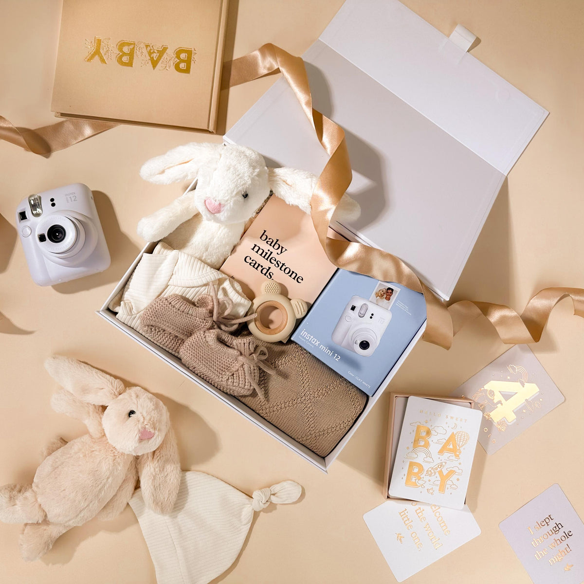 new-baby-gift-in-box-with-plush-bunny-knit-booties-camera-and-clothing