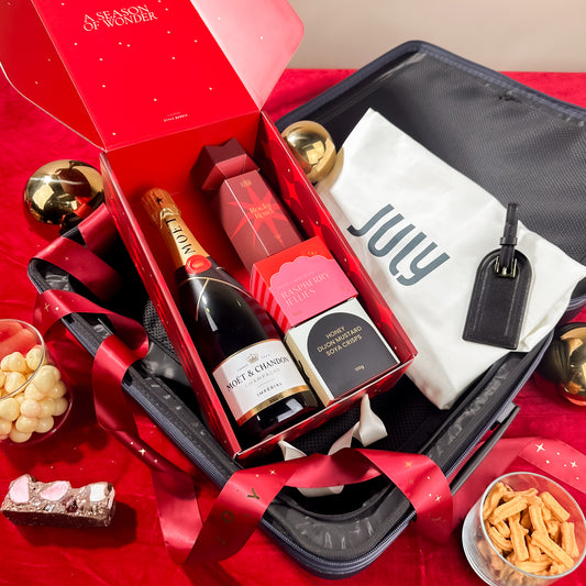 corporate-xmas-gifts-july-luggage-and-luggage-tag-with-champagne-hamper