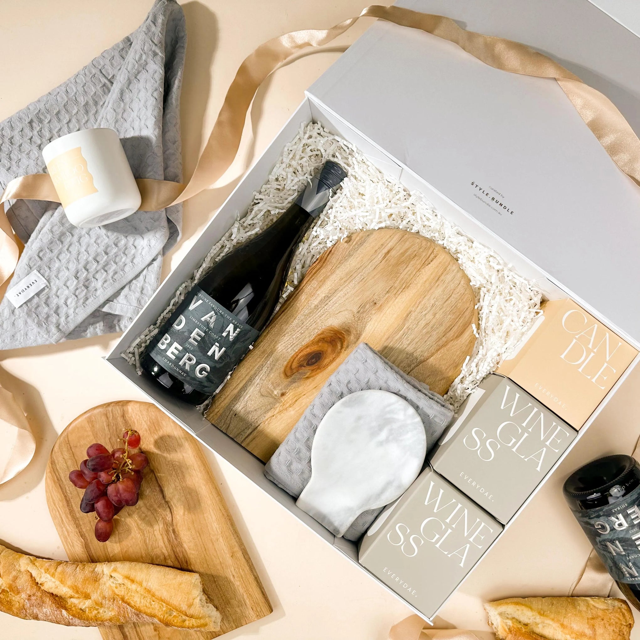 style-bundle-real-estate-hamper-for-settlement-the-classy-kitchen-with-arched-wood-serving-board-and-marble-spoon-rest-with-stemless-wine-glasses