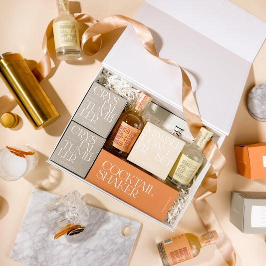 corporate-gift-hamper-with-mixology-cocktails-and-marble-serving-board-in-gift-box