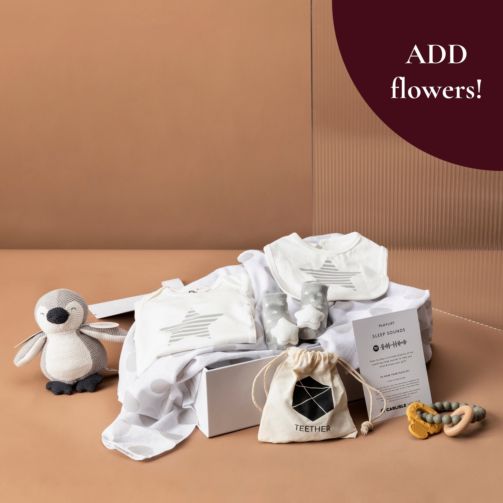 style-bundle-newborn-gift-hamper-the-new-arrival-with-muslin-wrap-and-baby-toy-and-teether-for-new-parents-and-baby