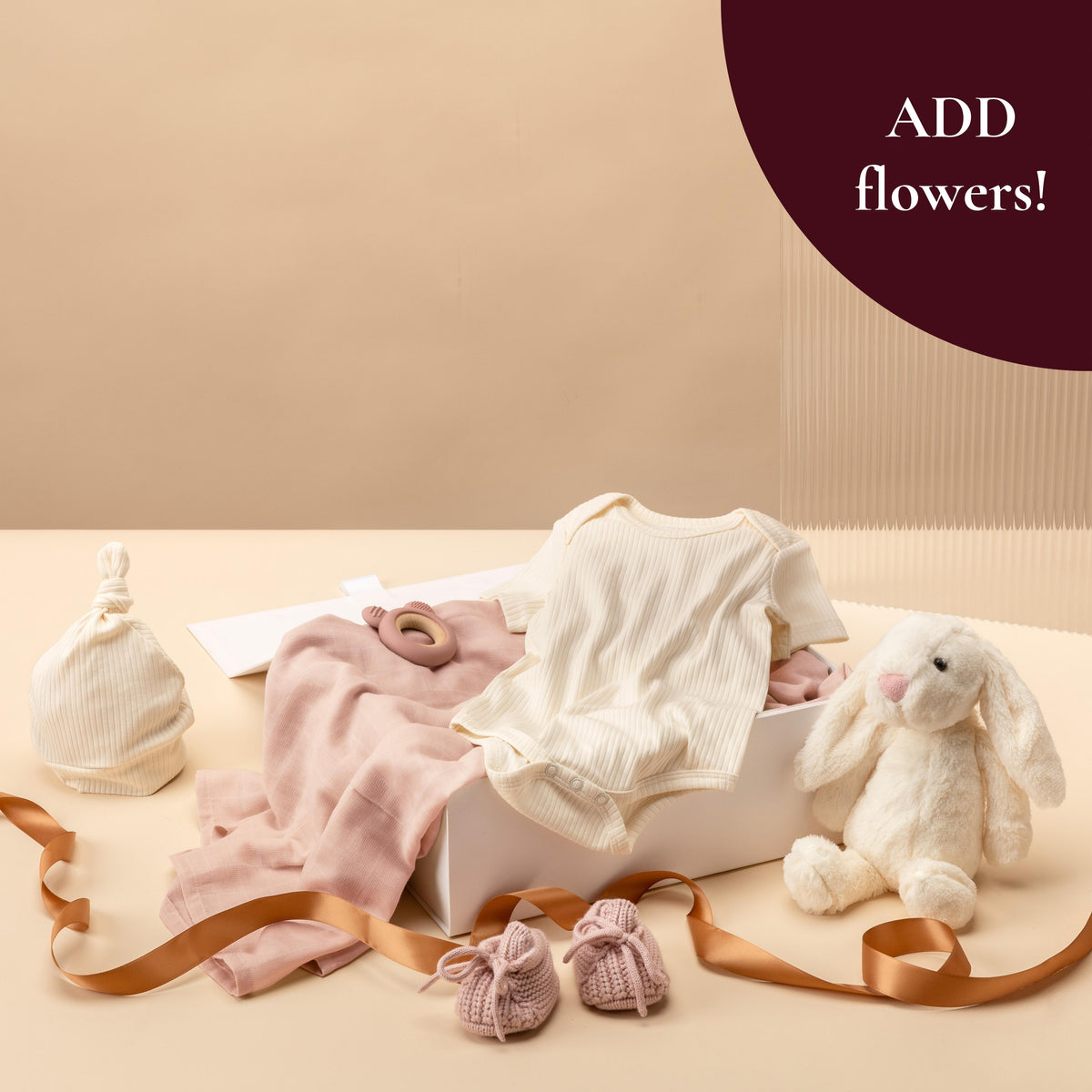 style-bundle-newborn-baby-gifts-for-girls-with-pink-muslin-wrap-and-cotton-onesie-with-plush-bunny-toy
