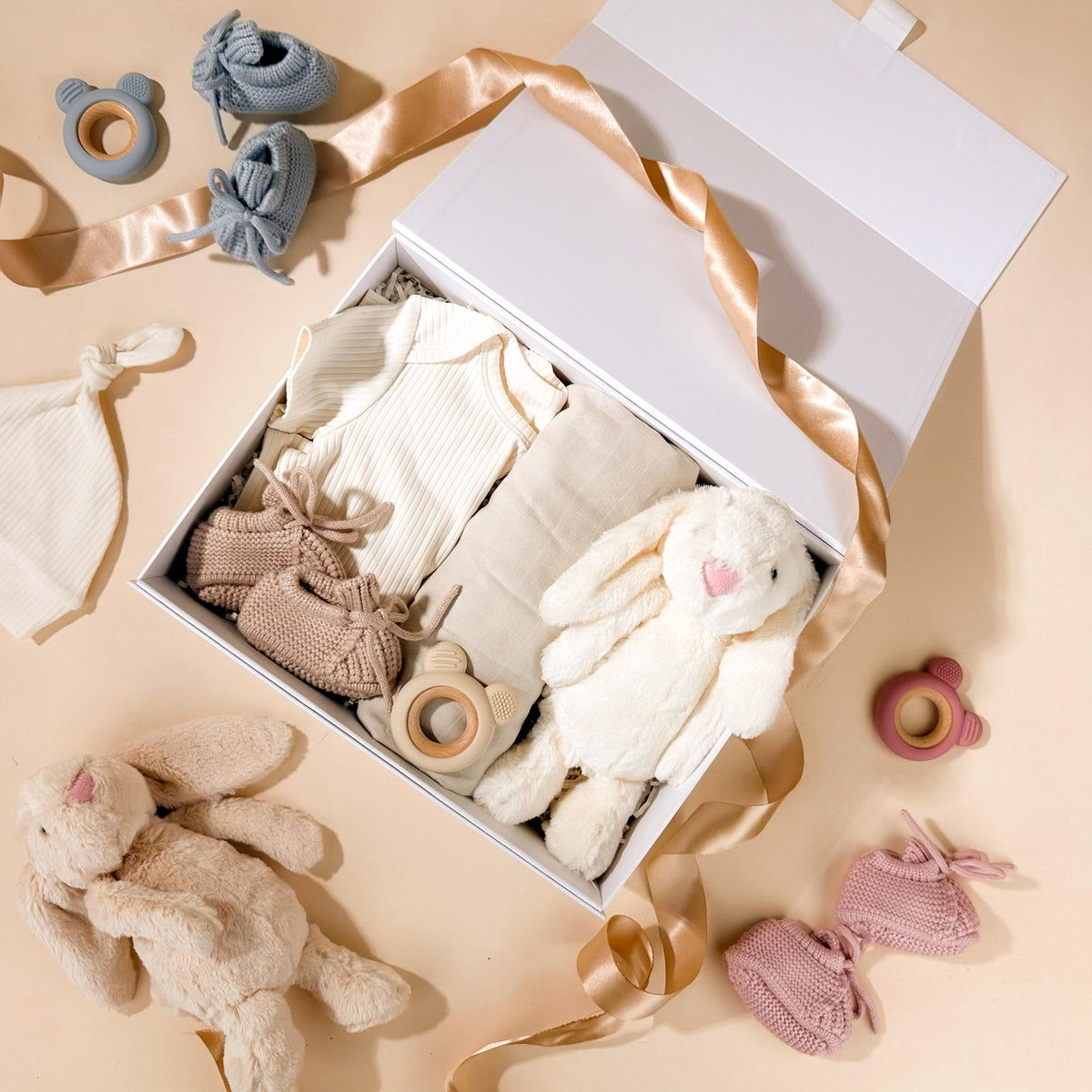 newborn-gift-hamper-with-neutral-unisex-booties-and-blanket-with-plus-bunny-toy