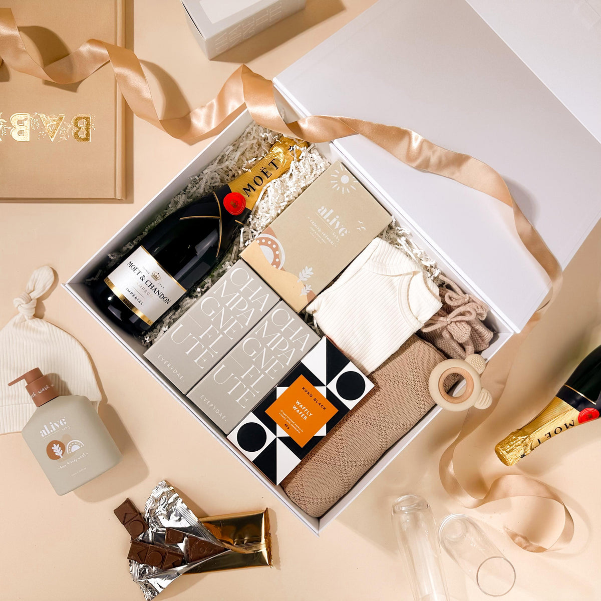 gifts-for-new-mums-baby-hamper-with-baby-blanket-and-moet-champagne-with-stemless-flutes-and-koko-black-chocolate