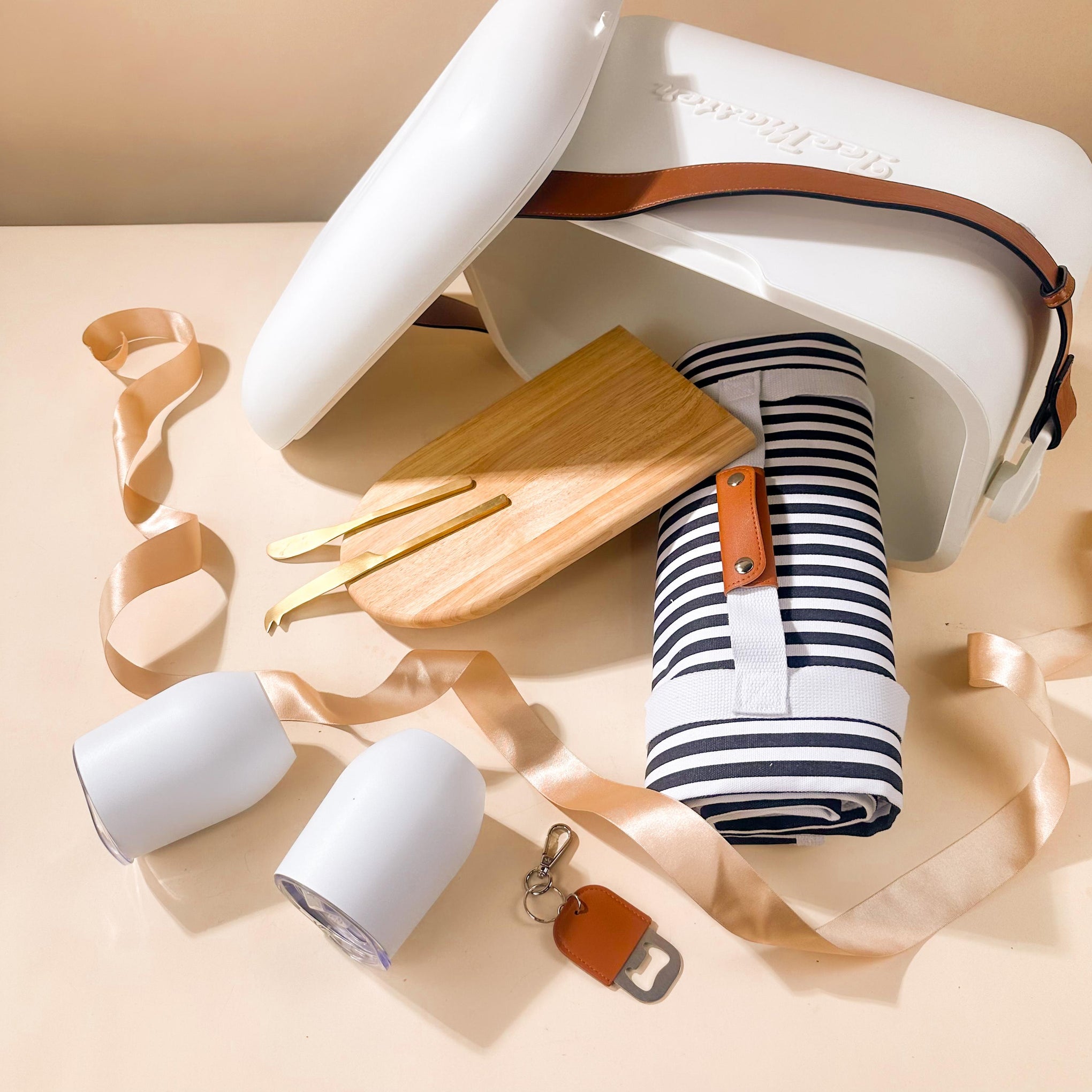 summer-gift-ideas-with-arched-chopping-board-and-insulated-wine-tumblers-inside-esky-hamper
