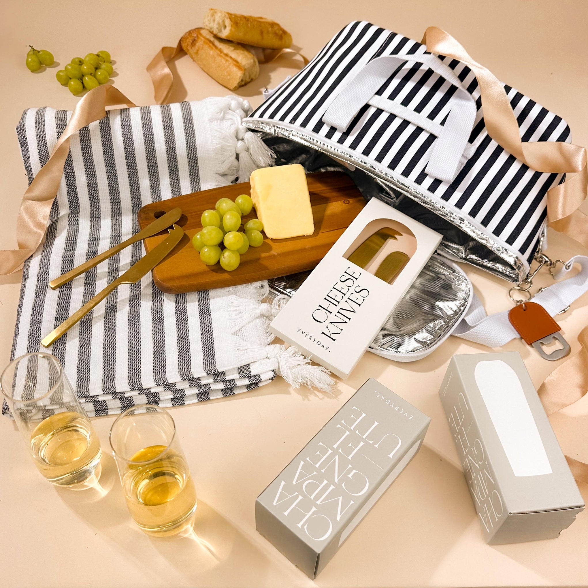 corporate-gifting-for-clients-with-striped-insulated-cooler-bag-and-turkish-towel-with-champagne-flutes