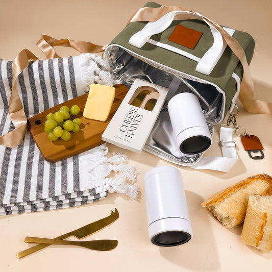 beach-themed-gifts-with-insulated-cooler-bag-and-turkish-towel-with-can-coolers-and-timber-cheese-board
